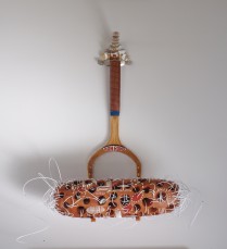 NON RONG (Plywood, hollowed out hardwood, plastic string, oil, leather + mirrors, 63cm x 56cm x 23cm, Dirk Marwig 2008)