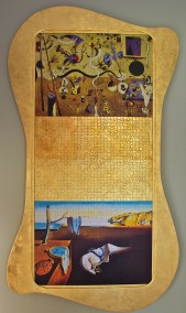 STILL LOADING…  (Super ‘Kitsch’ object:  3000pcs -puzzle-+ gilded plywood, 185cm x 103.5cm x 4.5cm, Dirk Marwig 2009)